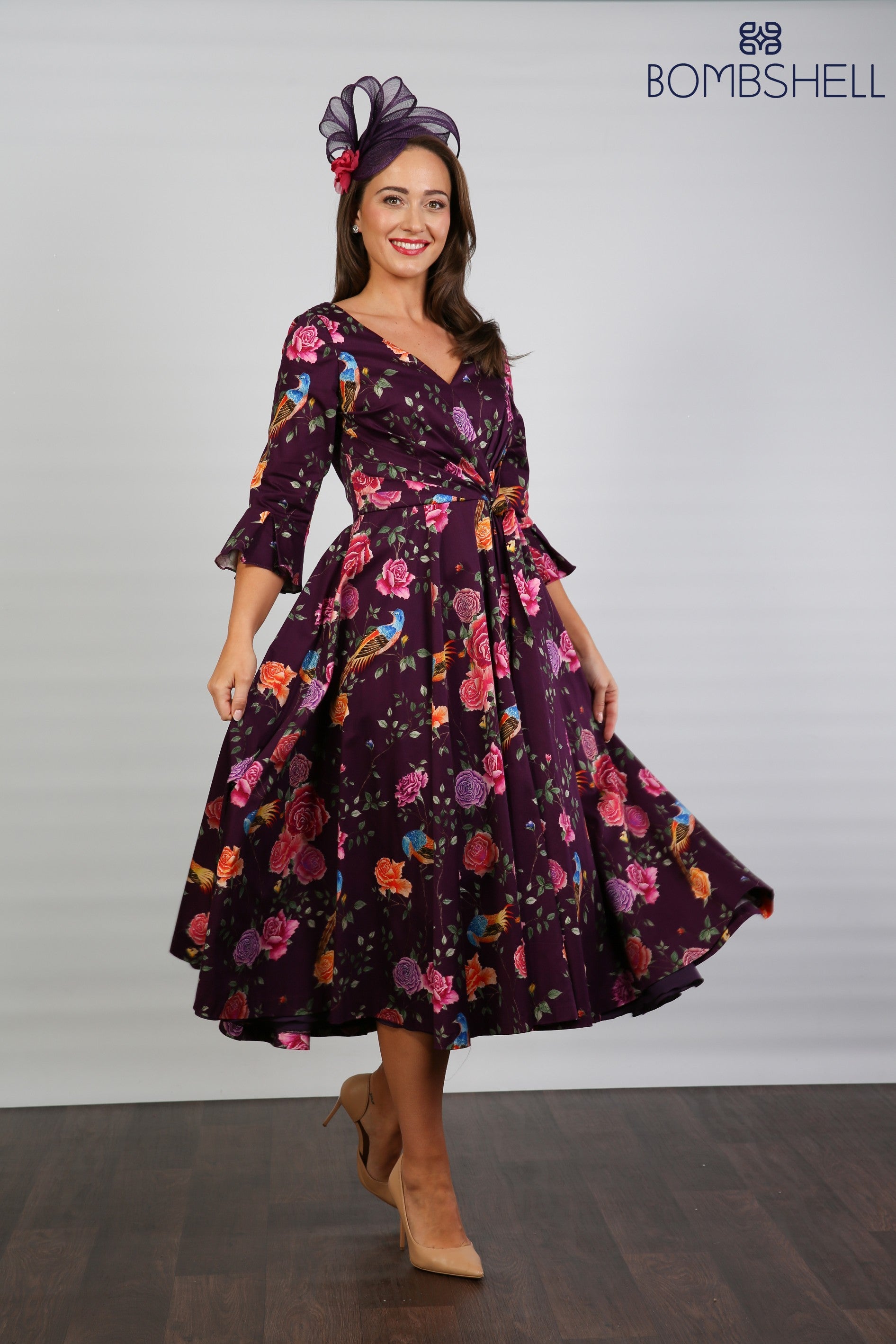 Bombshell Rosalind Confident Ruffle Cuff Dress in Imperial Phoenix