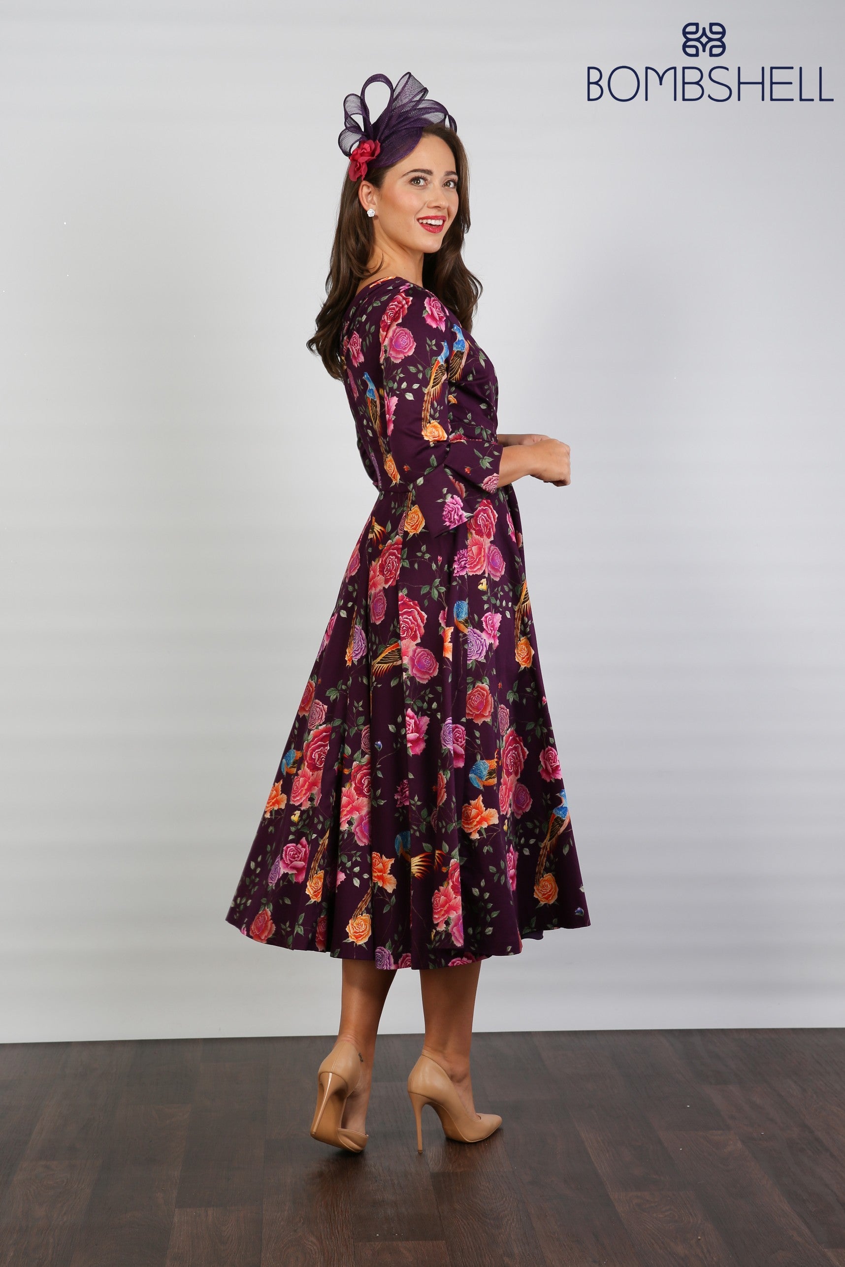 Bombshell Rosalind Confident Ruffle Cuff Dress in Imperial Phoenix