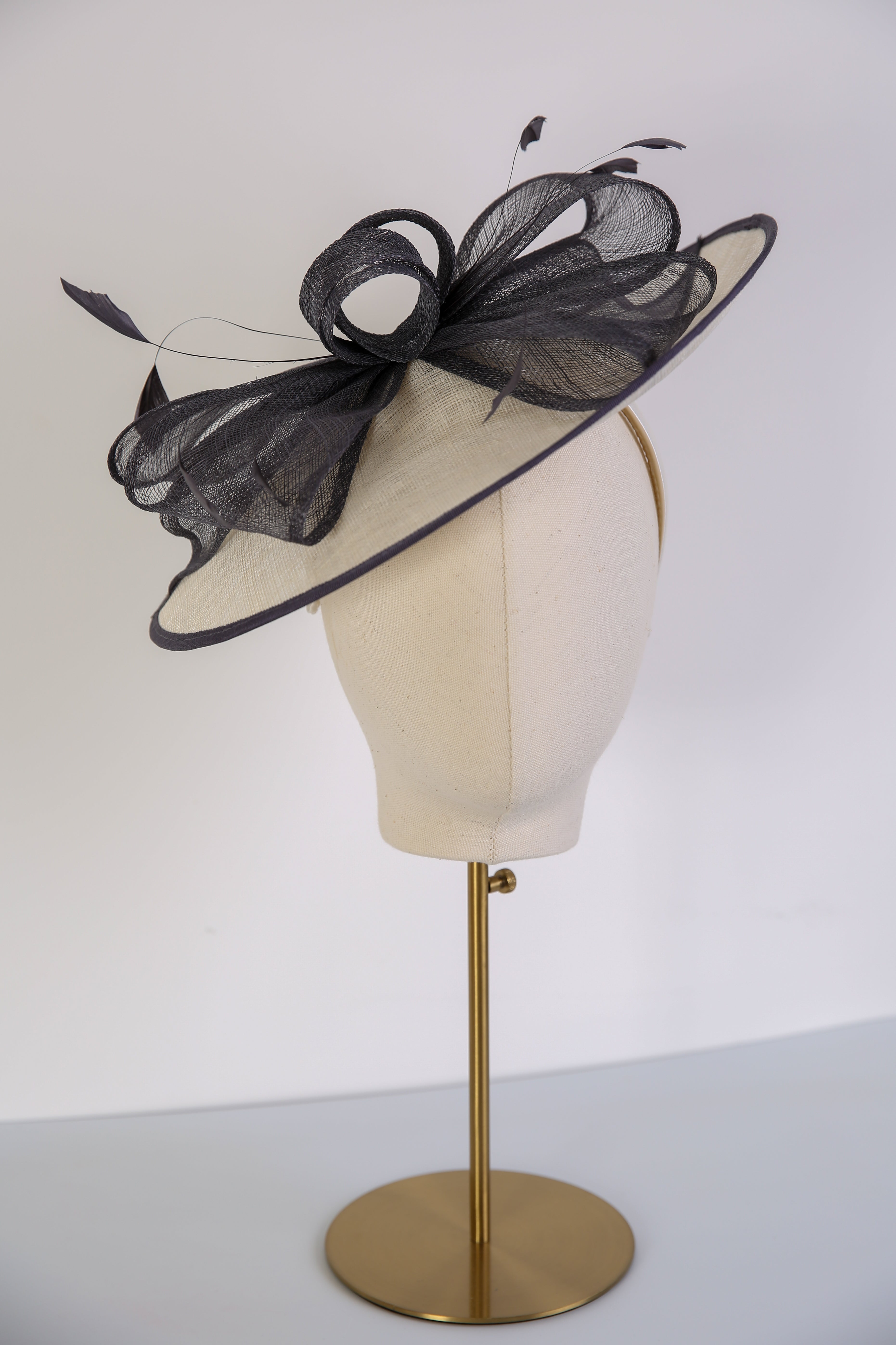 Condici Wide Looped Fascinator in Cream
