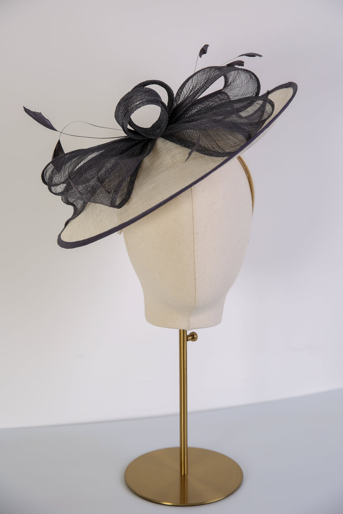 Condici Wide Looped Fascinator in Cream