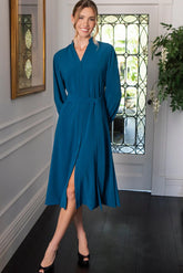 Woman in blue button fastening dress