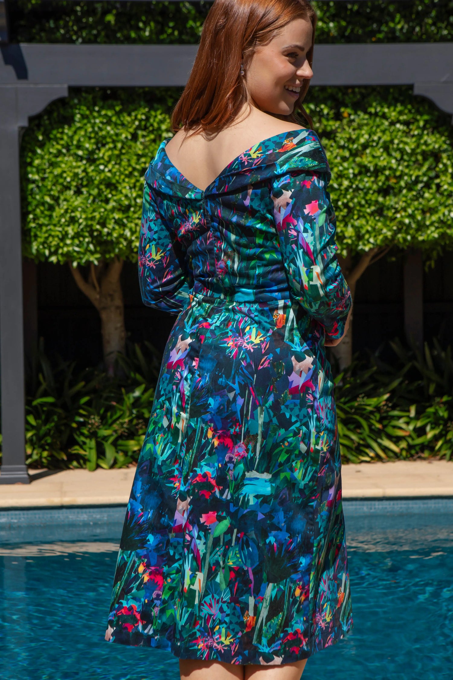 Bombshell Chic Edge Of the Shoulder Dress in Midnight Tropique Green