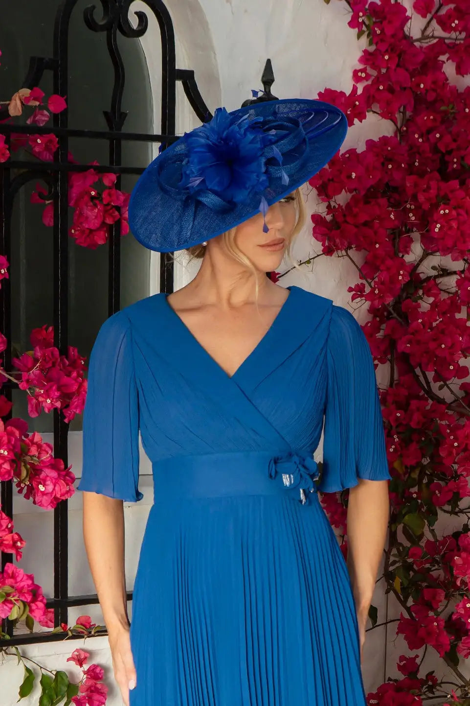 Sinamay Hatinator by Condici With Coque Feathers in Royal Blue