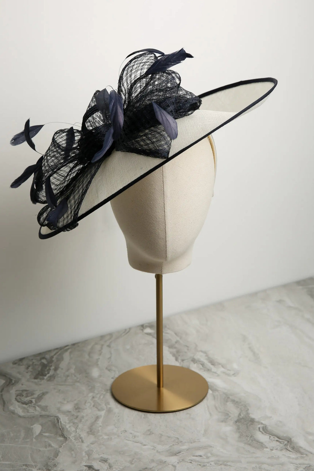 Condici Picture Perfect Fascinator with soft trim and feathers in Cream and Navy