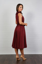 Woman in ruby silk occasion dress