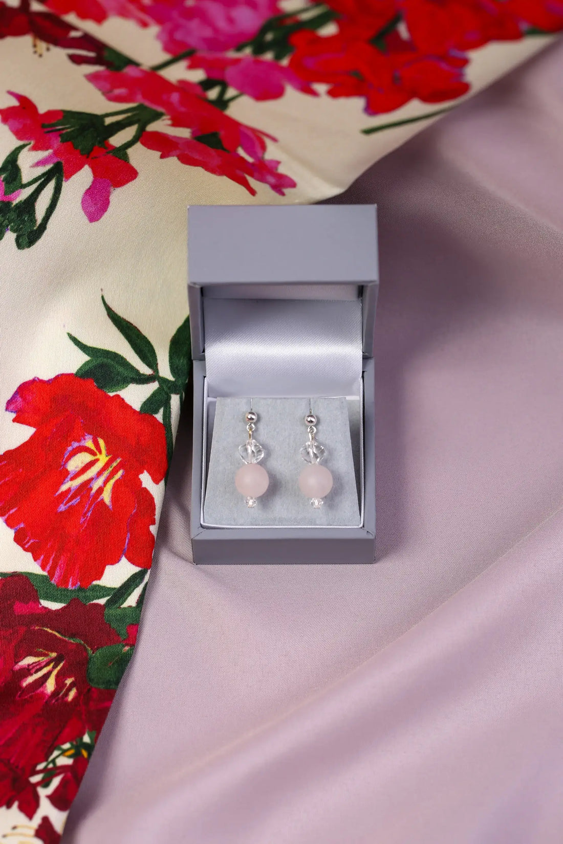 Rose quartz drop earrings with silver plated post fittings.